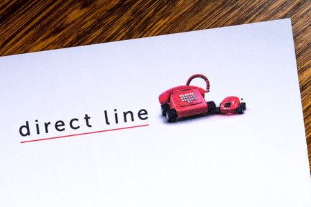 LONDON, UK - MARCH 27TH 2018: A close-up of the Direct Line company icon, pictured on a letterhead,...