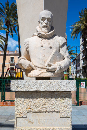 DENIA, SPAIN - APRIL 12TH 2018: A sculpture of famous Spanish writer Miguel de Cervantes, located in the historic city of Denia, in Spain, on 12th April 2018.のeditorial素材