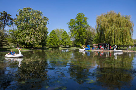 COLCHESTER, UK - MAY 7TH 2018: A view of the boating lake in Colchester Castle Park in the historic town of Colchester, Essex, UK, on 7th May 2018.のeditorial素材