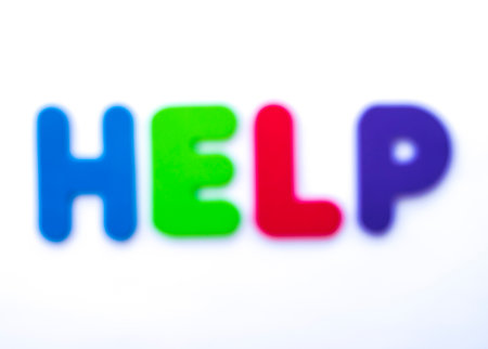 The word HELP blurred over a white background.の写真素材