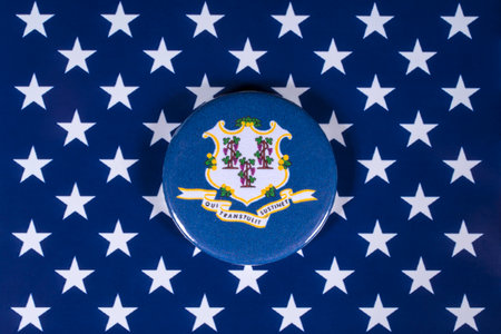 LONDON, UK - APRIL 27TH 2018: The symbol of the State of Connecticut, pictured over the flag of the United States of America, on 27th April 2018.のeditorial素材