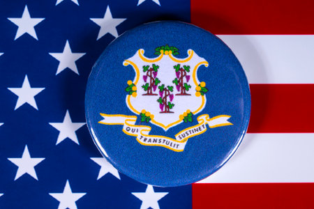 LONDON, UK - APRIL 27TH 2018: The symbol of the State of Connecticut, pictured over the flag of the United States of America, on 27th April 2018.のeditorial素材