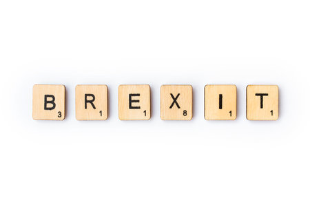 LONDON, UK - JUNE 28TH 2018: The word BREXIT spelt out with wooden letter Scrabble tiles, on 28th June 2018.のeditorial素材