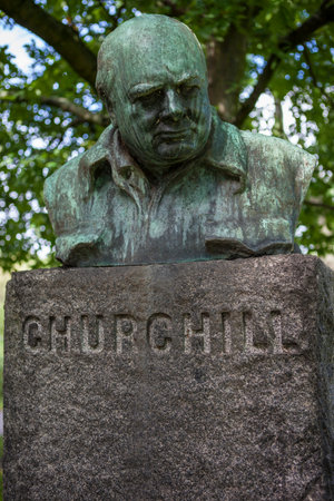 A bust British wartime leader Sir Winston Churchill, located in Churchillparken, also known as Churchill Park, in the city of Copehnagen, Denmark.のeditorial素材