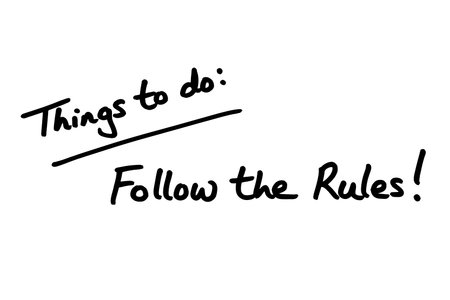 Things to do - Follow the Rules! handwritten on a white background.の写真素材