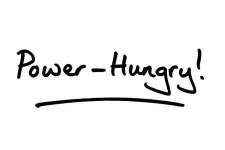 Power-Hungry, handwritten on a white background.の写真素材