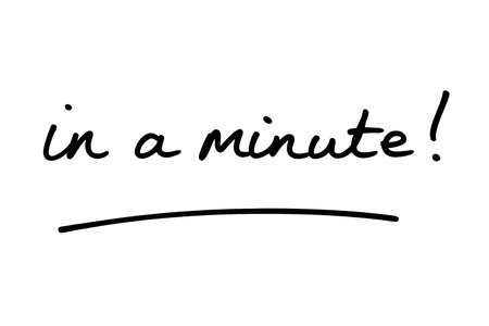 in a minute! handwritten on a white background.の写真素材