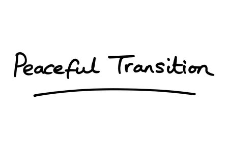 Peaceful Transition, handwritten on a white background.の写真素材