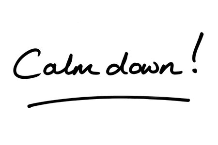 Calm down! handwritten on a white background.の写真素材