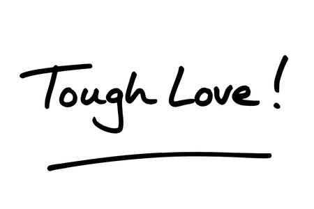 Tough Love! handwritten on a white background.の写真素材