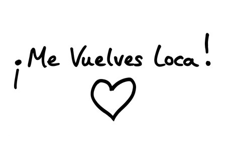 Me vuelves loca! - meaning Im Crazy About You, in the Spanish language, with a heart illustration, handwritten on a white background.の写真素材