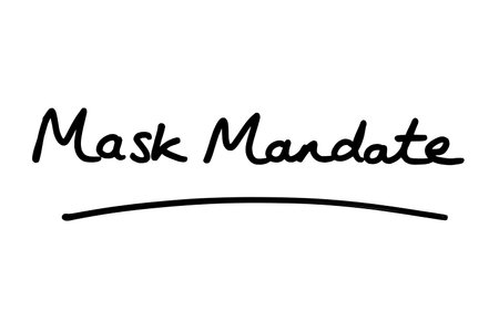 Mask Mandate, handwritten on a white background.の写真素材