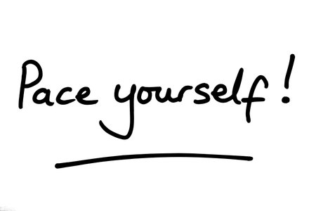 Pace yourself! handwritten on a white background.の写真素材