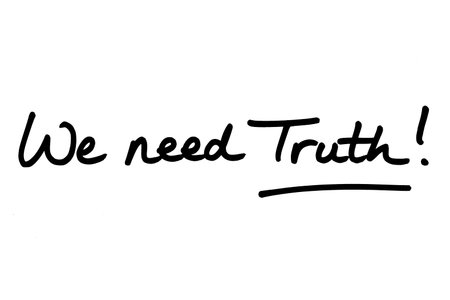 We need Truth! handwritten on a white background.の写真素材