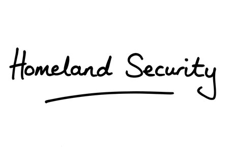 Homeland Security, handwritten on a white background.の写真素材