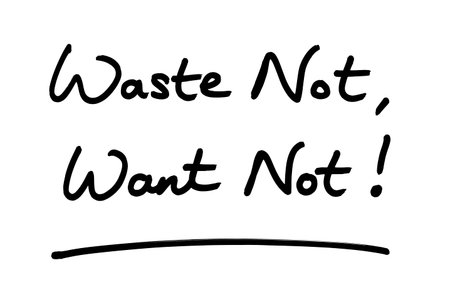 Waste Not, Want Not! handwritten on a white background.の写真素材