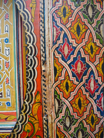 Partial view of traditional, colourfully painted door in Fez, Morocco