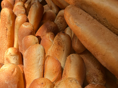 Piles of freshly baked baguette loaves of bread, Essaouira, Morocco