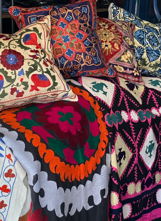 Colourful, handwoven patterned cushions and covers on sale, Uzbekistanの写真素材