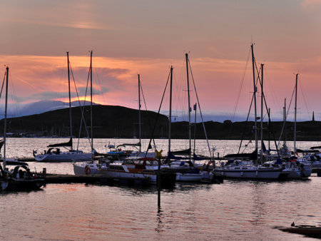 Yachts in harbour with beautiful sunset, Oban, Scotland. High quality photoの写真素材