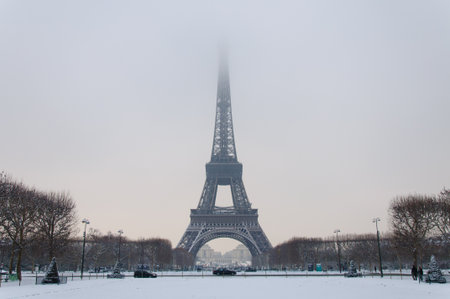 The Eiffel tower with the head in the clouds