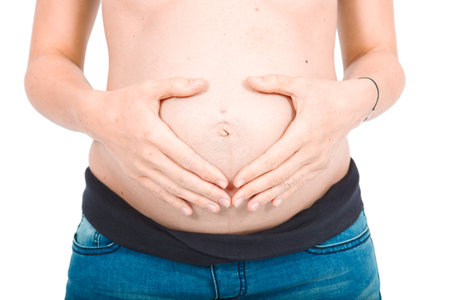Man posing with his pregnant wifeの写真素材