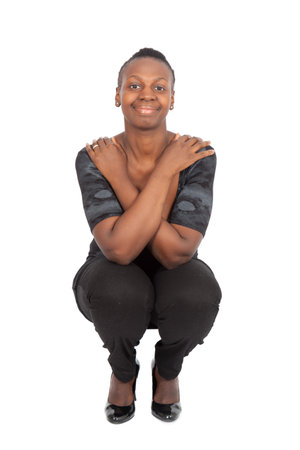 Beautiful black woman doing different expressions in different sets of clothes: posingの写真素材