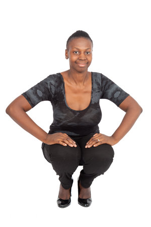 Beautiful black woman doing different expressions in different sets of clothes: posingの写真素材