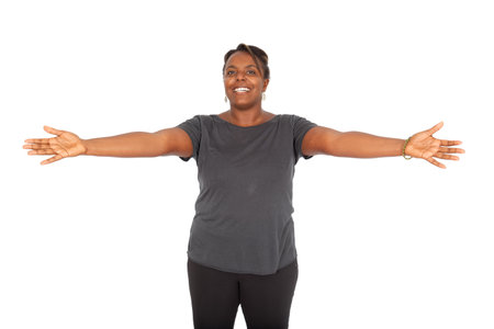 Beautiful black woman doing different expressions in different sets of clothesの写真素材