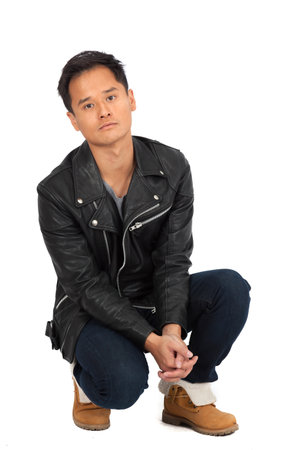 Handsome man doing different expressions in different sets of clothes: posingの写真素材