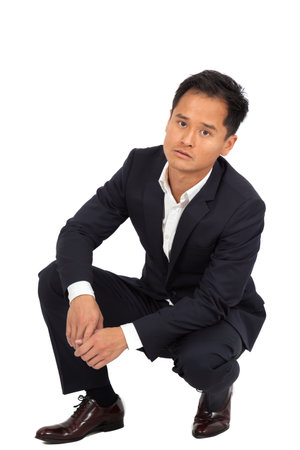 Handsome man doing different expressions in different sets of clothes: posingの写真素材