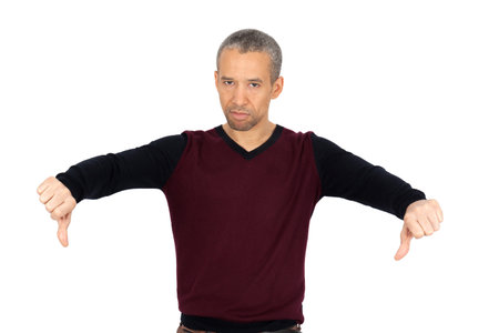 Handsome man doing different expressions in different sets of clothes: thumbs downの写真素材