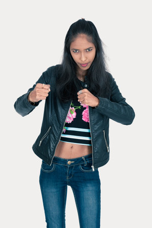 Beautiful woman doing different expressions in different sets of clothes: boxeの写真素材