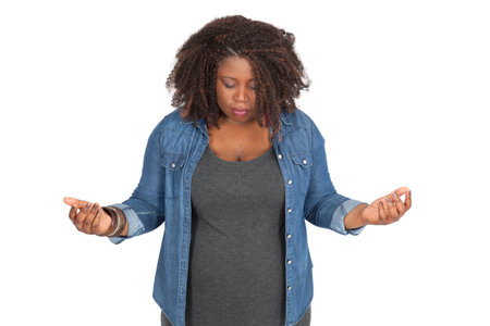 Beautiful woman doing different expressions in different sets of clothes: prayingの写真素材