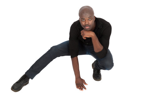 Handsome man doing different expressions in different sets of clothes: posingの写真素材