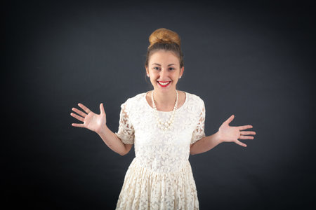 Beautiful girl doing different expressions in different sets of clothes: surprise