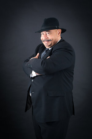 Handsome man doing different expressions in different sets of clothes: arms crossedの写真素材