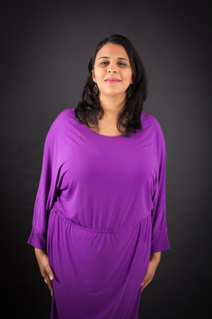 Beautiful woman doing different expressions in different sets of clothes: at attentionの写真素材