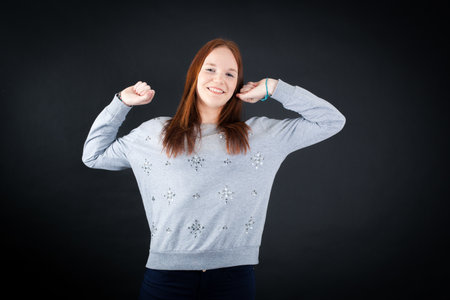 Beautiful woman doing different expressions in different sets of clothes: wake upの写真素材