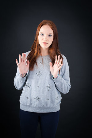 Beautiful woman doing different expressions in different sets of clothes: innocent
