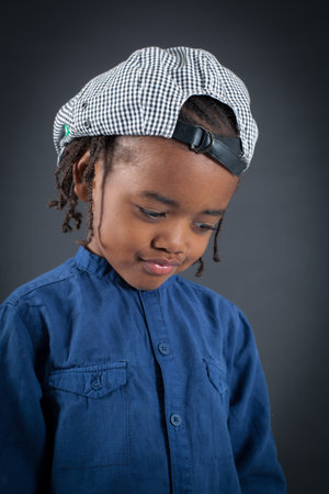 Handsome boy doing different expressions in different sets of clothes: sadの写真素材