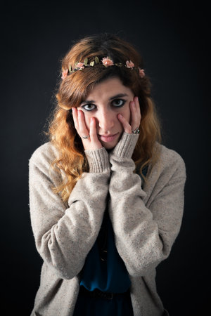 Beautiful woman doing different expressions in different sets of clothes: posing