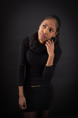 beautiful woman doing different expressions in different sets of clothes: tired