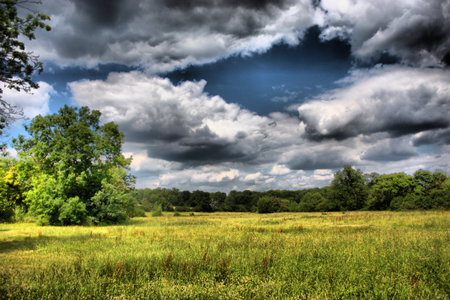 Cloudy sky above a rural sceneの写真素材