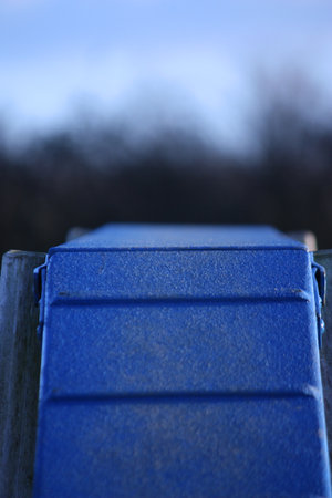 blue agility dog walk surface against a blue sky backgroundの写真素材