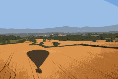 Shadow of a hot air balloon flying over rural farmlandのイラスト素材