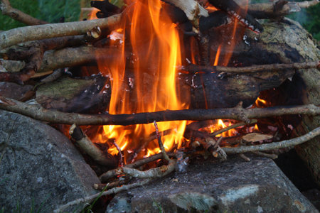 Bright Orange Flames in an open fireの写真素材