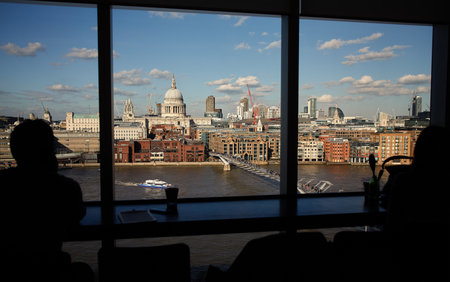 London St. Paul`s Cathedral, view from Tate Modern with Silhouetted unnamed peopleの写真素材