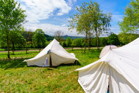white tents in a scout campの写真素材