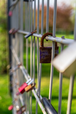 Lockers symbolizing love forever on the fence with vintage style friendsの写真素材